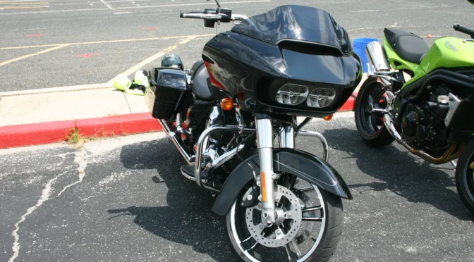 Harley-Davidson motorcycle parked with sport bike at a rider safety training course.